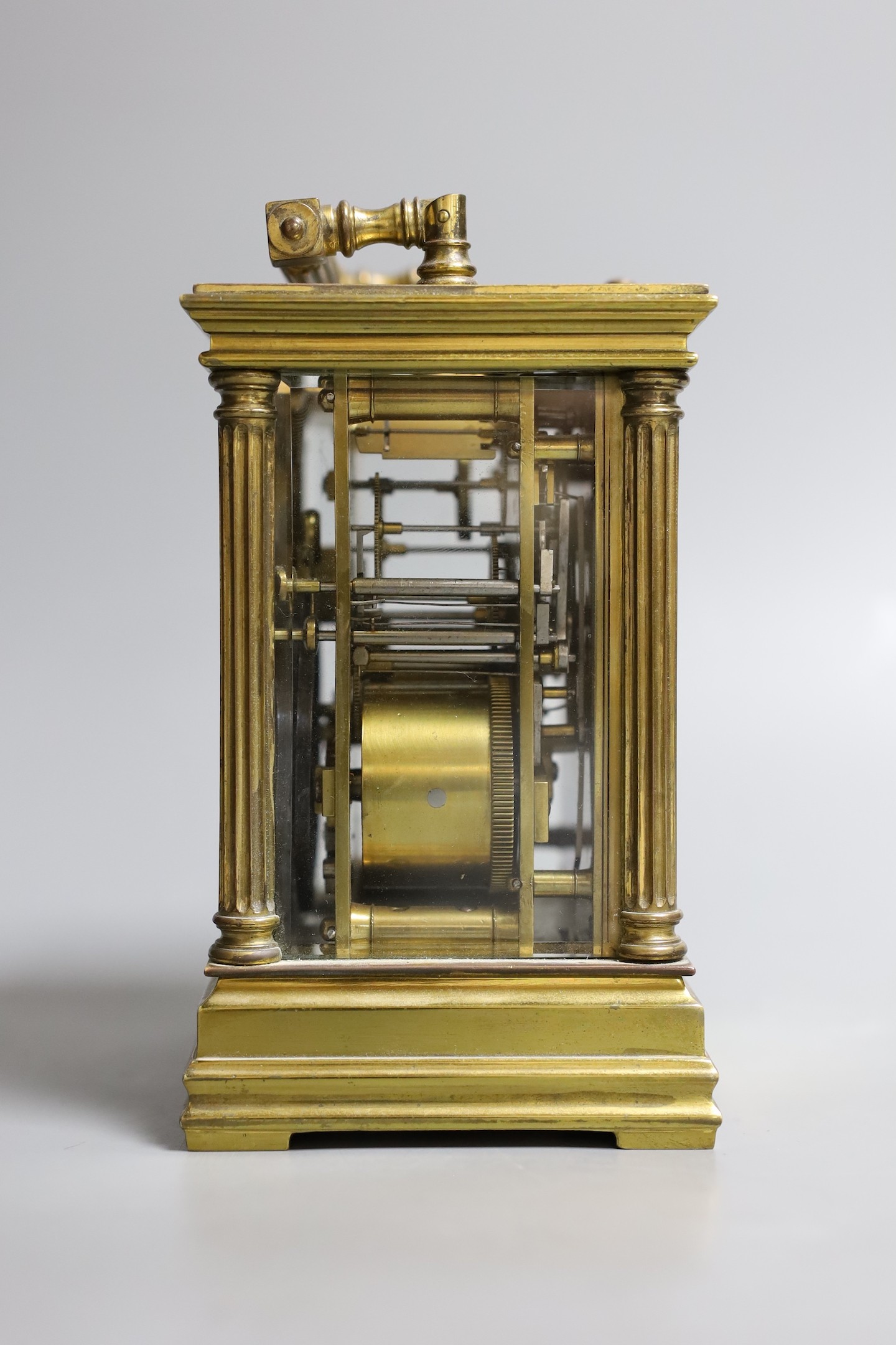 A French quarter repeating gilt brass carriage clock, 14 cms high